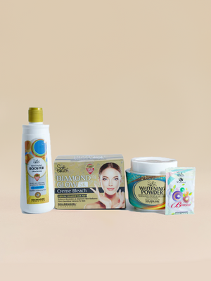 Collection of beauty products including a bottle, box, jar, and packets on a beige background