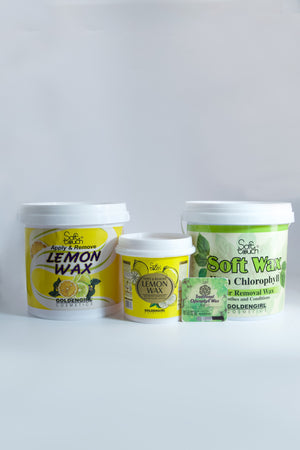 Three containers of lemon wax and soft wax on a white background