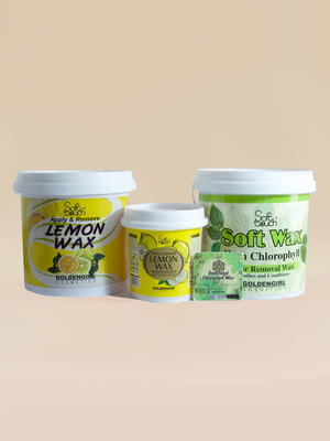 Three containers of Soft Wax products on a beige background