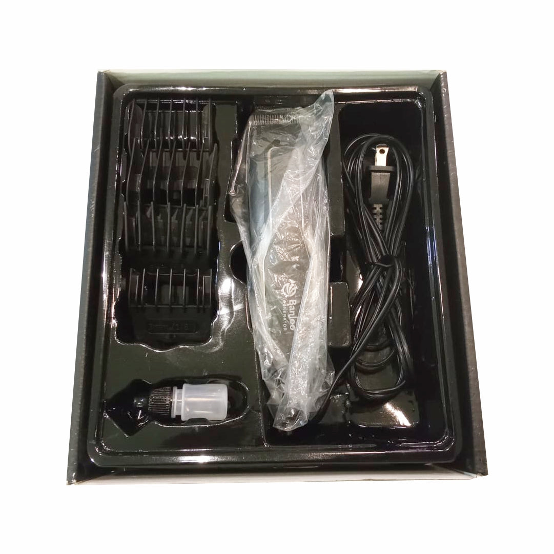 Hair trimmer set with attachments in a black box on a white background