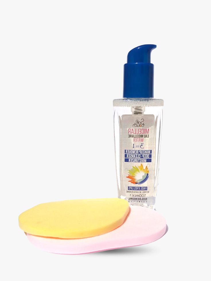 Skincare product with a blue pump and two sponges on a white background