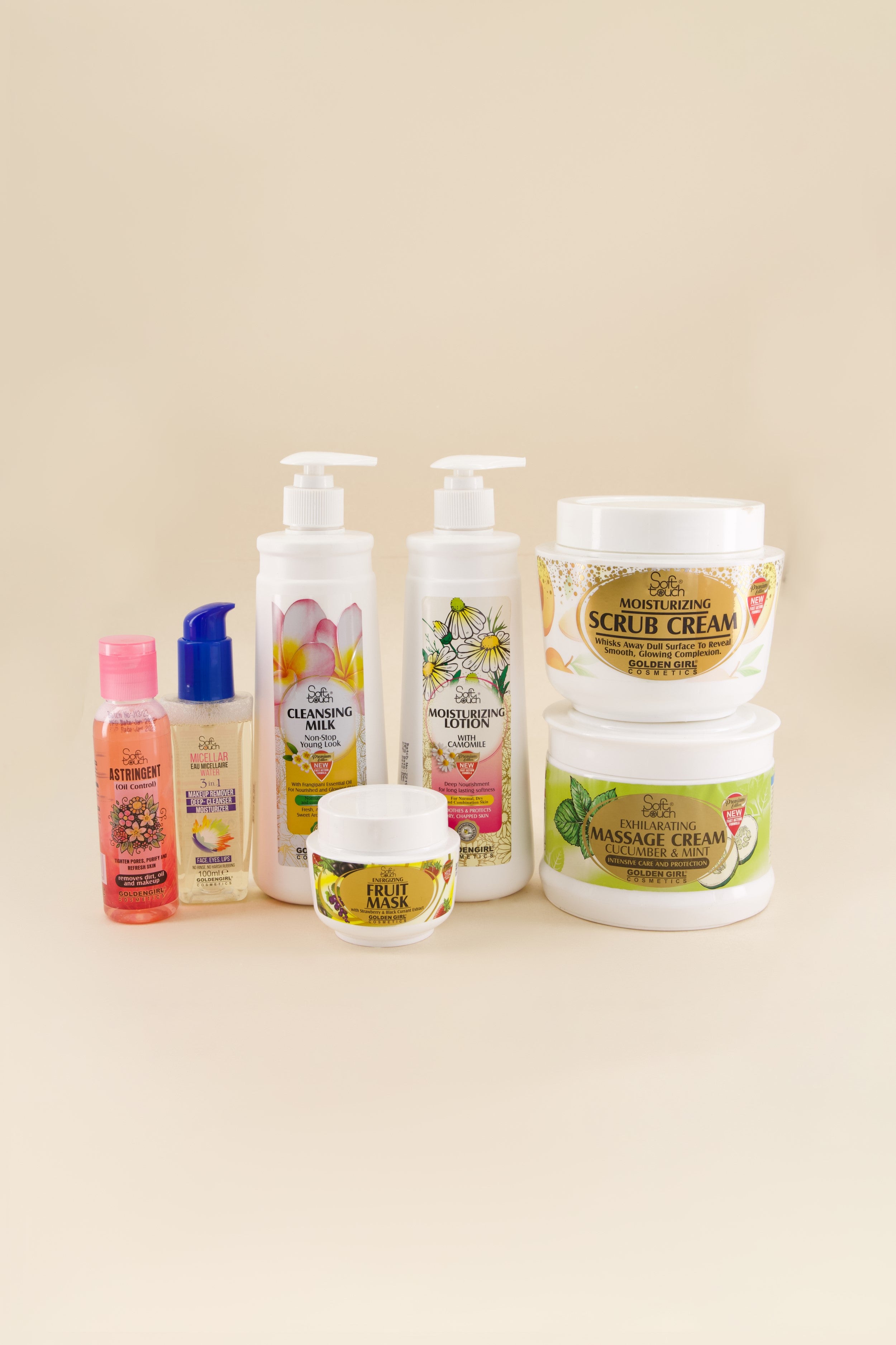 Collection of skincare products on a beige background