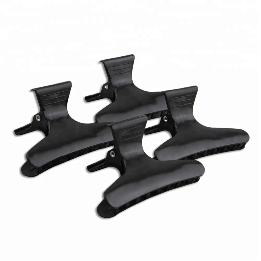 “Butterfly hair clip for styling and sectioning hair.”