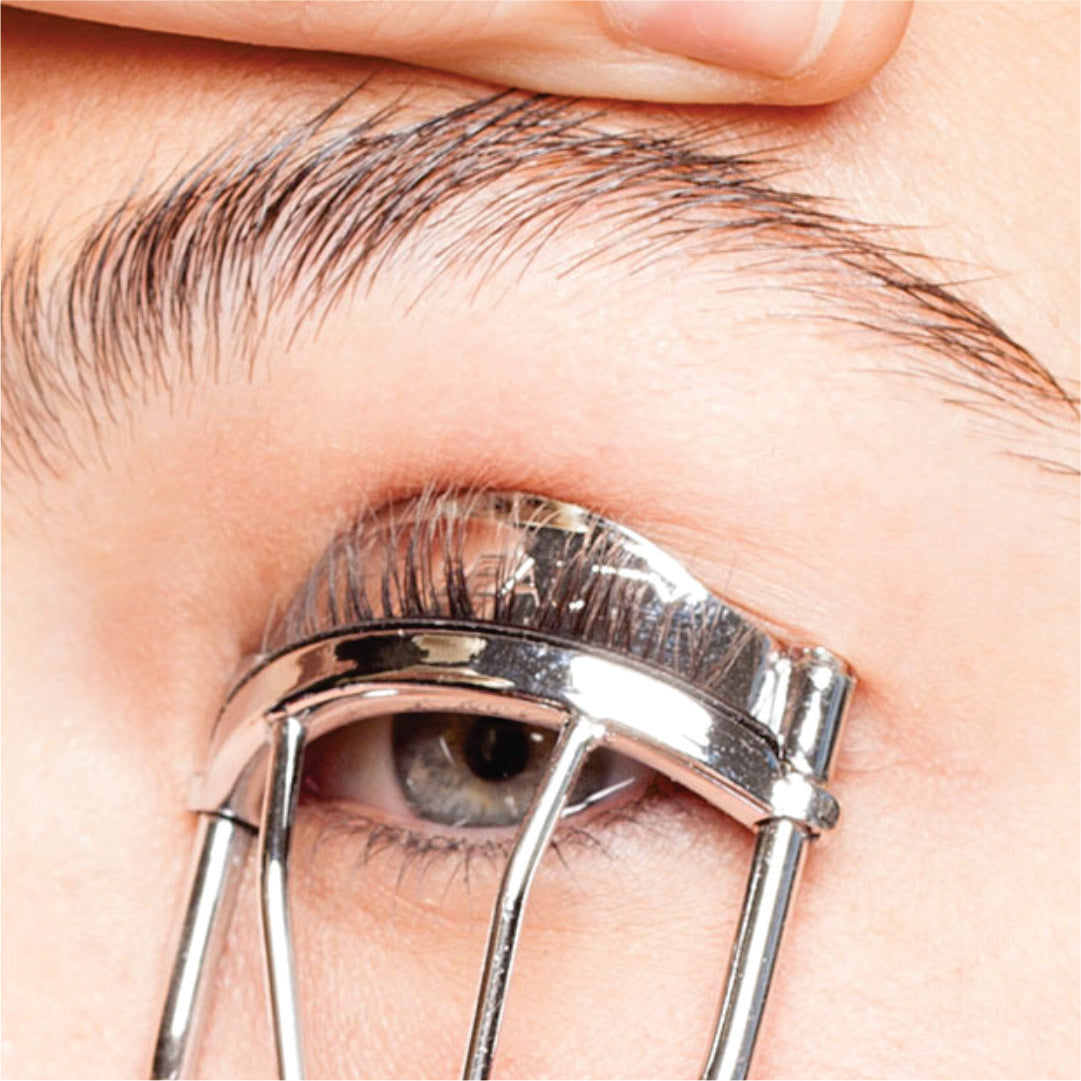 “Eyelash curler tool for precise and smooth curling of lashes.”