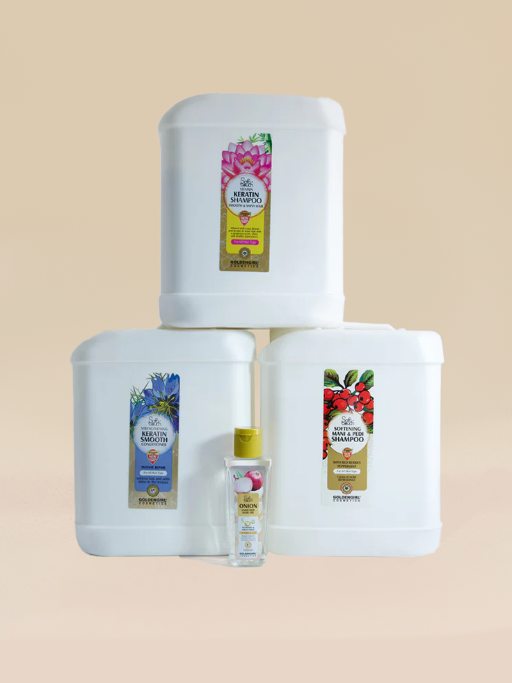 Set of hair care products including shampoo bottles and a tube on a beige background