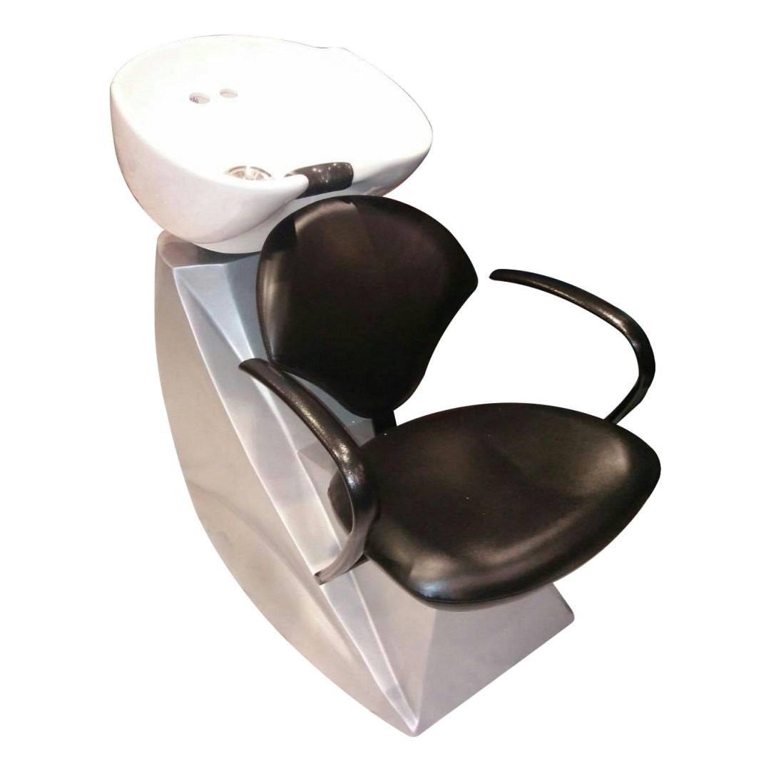 A modern salon shampoo chair with a solid steel body, elegant upholstery, and adjustable leg rest.