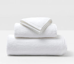 “White salon towel for hair drying and spa treatments.”