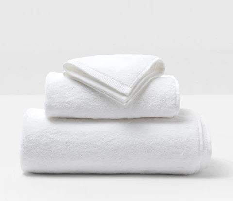 “White salon towel for hair drying and spa treatments.”
